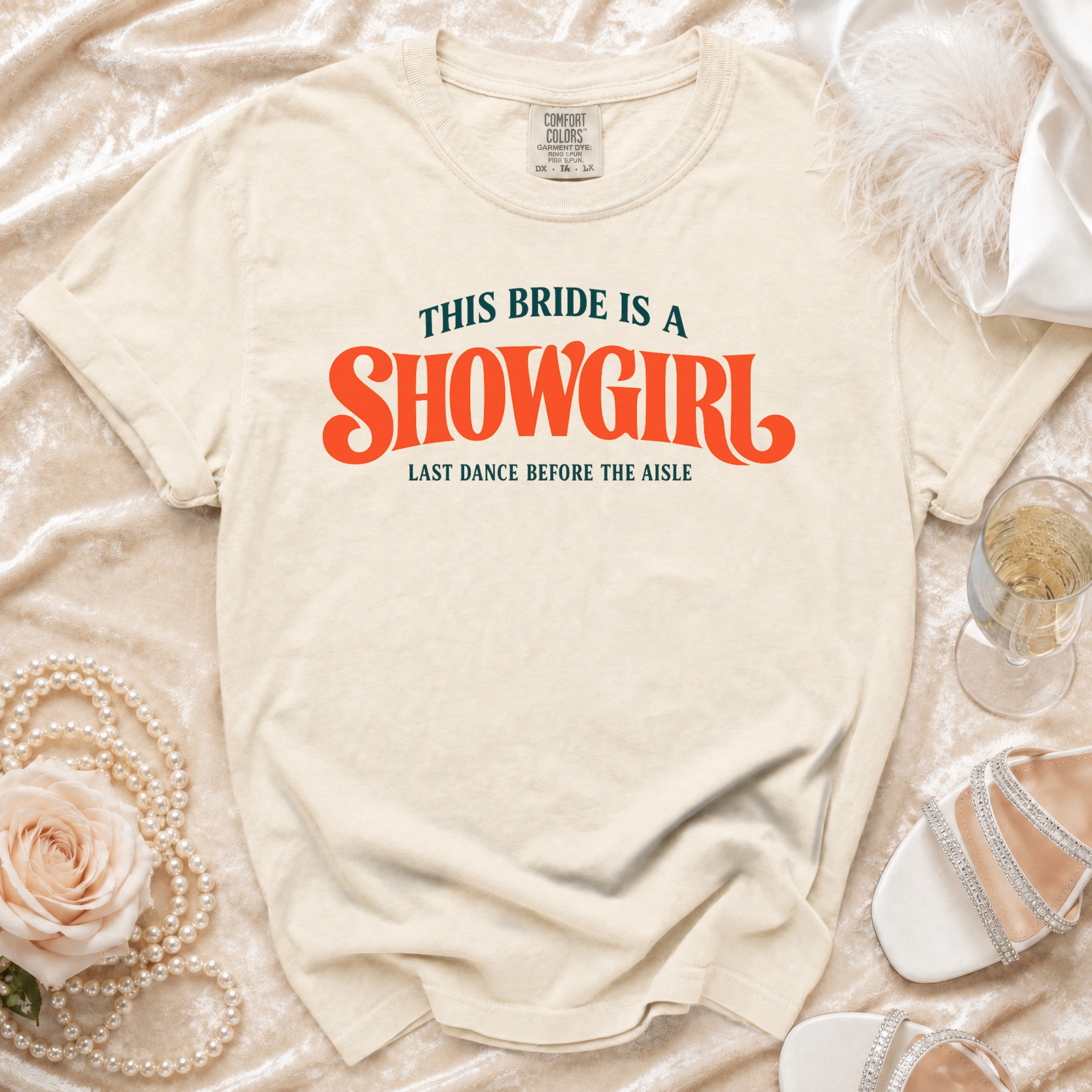 Cream t-shirt with "This Bride is a Showgirl" text.