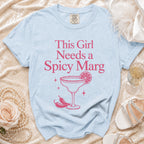 Light blue t-shirt with pink text and graphics of a margarita and chili peppers.