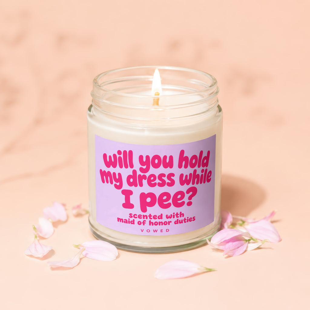 Scented candle asks "Will you hold my dress while I pee?".