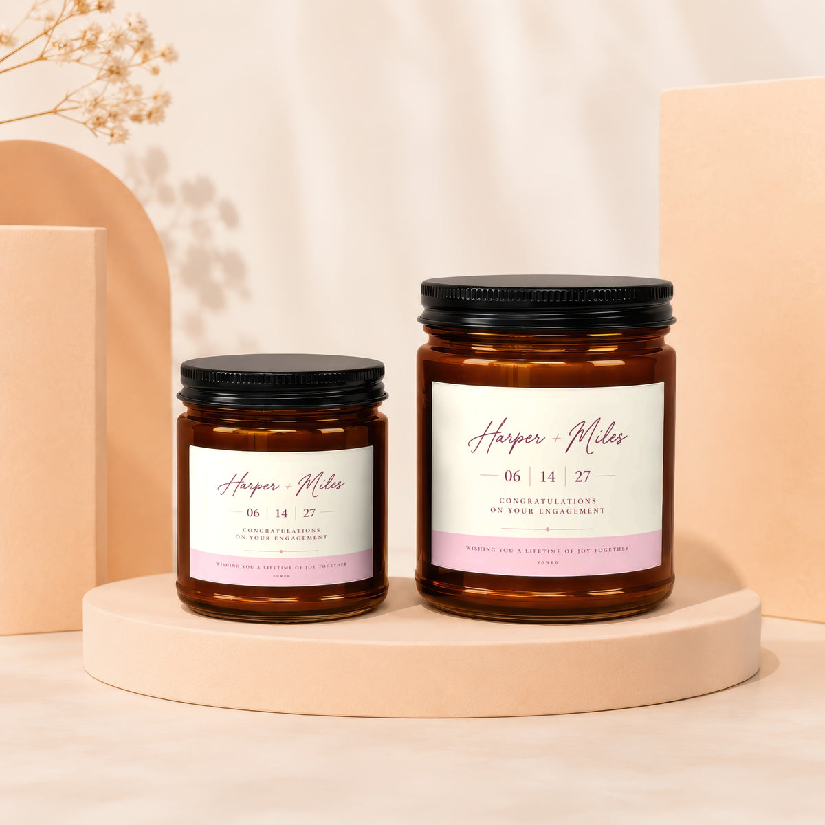 Two engagement candles, personalized with names Harper + Miles and date 06 14 27.