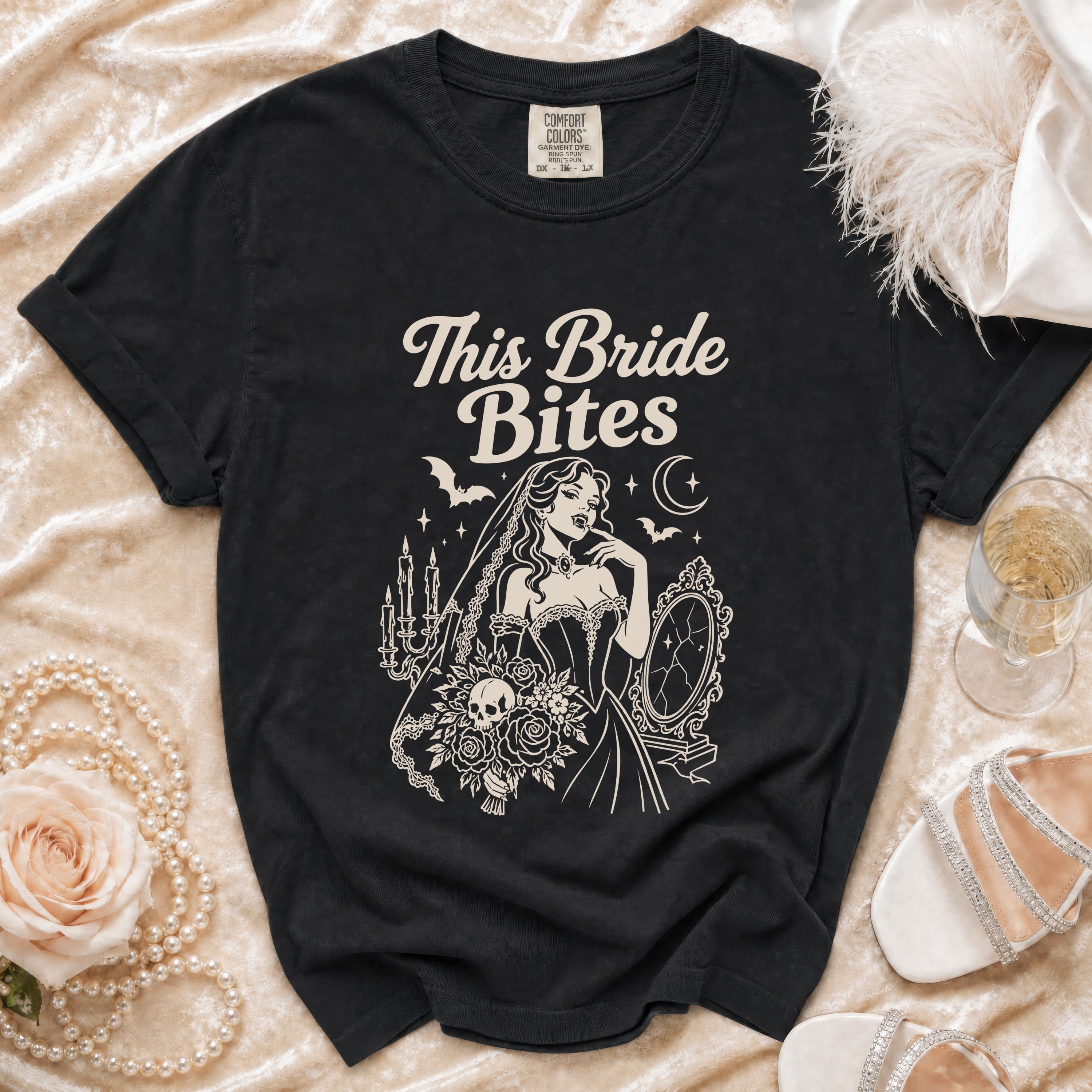 Black t-shirt with "This Bride Bites" text and vampire bride graphic.