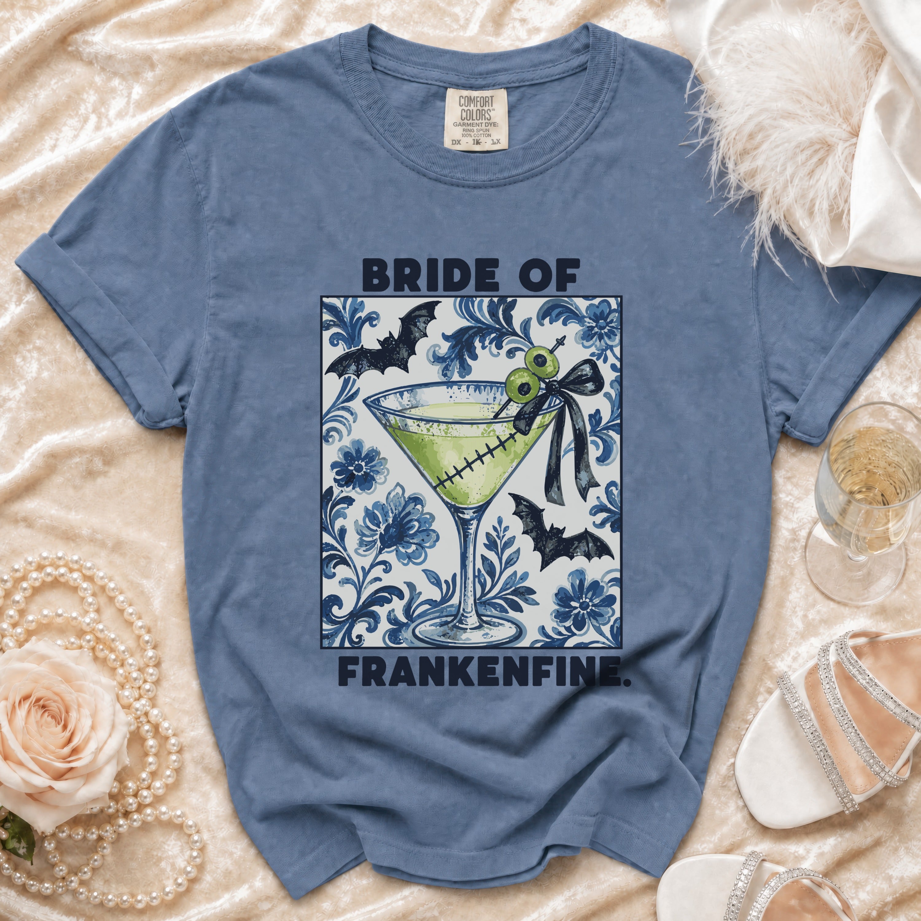 Blue t-shirt with "Bride of Frankenfine" text and a martini glass graphic.