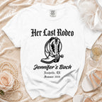 White t-shirt with "Her Last Rodeo" and cowboy boot graphic.