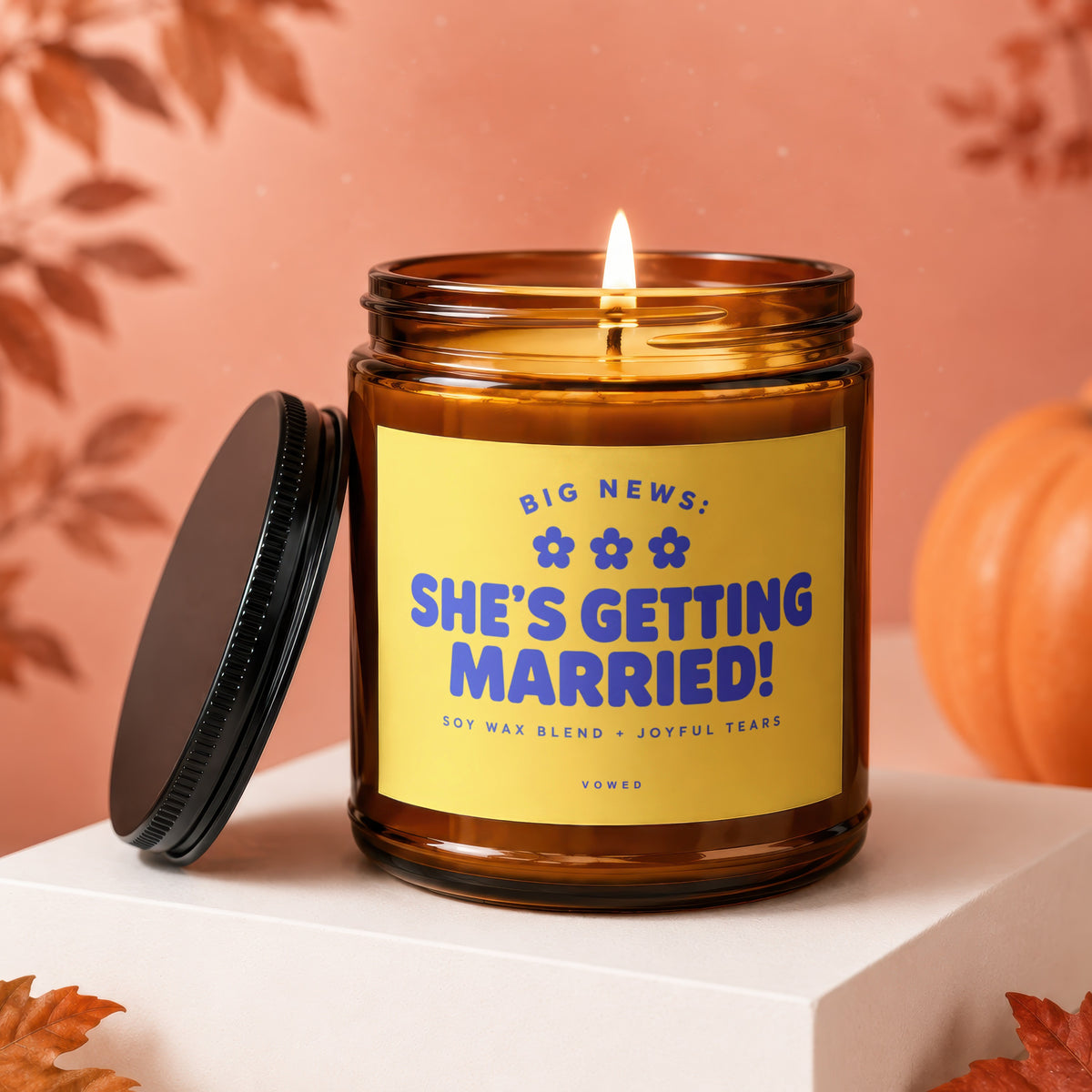 Amber candle with "She's Getting Married!" text, soy wax blend, joyful tears.