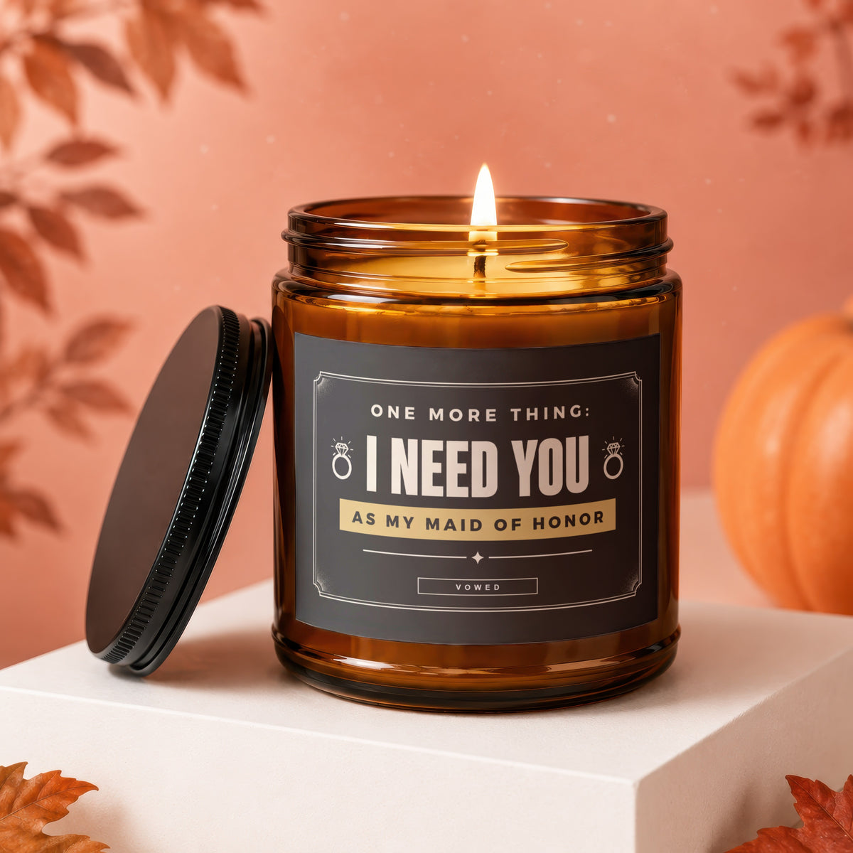 Amber jar candle with "I NEED YOU AS MY MAID OF HONOR" text and ring icons.