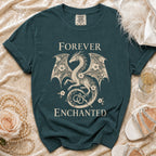 Teal t-shirt with a dragon graphic, "Forever Enchanted" text, and wedding rings.