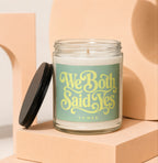 Glass candle with label that reads "We Both Said Yes VOWED".