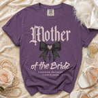 Purple t-shirt reading "Mother of the Bride" with a bow and "I raised the bride. Now I just need to survive the planning."
