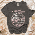 Charcoal t-shirt with pink text and graphic: "Mother of the Bride Raising Princess is my full-time job. You're just her bonus."