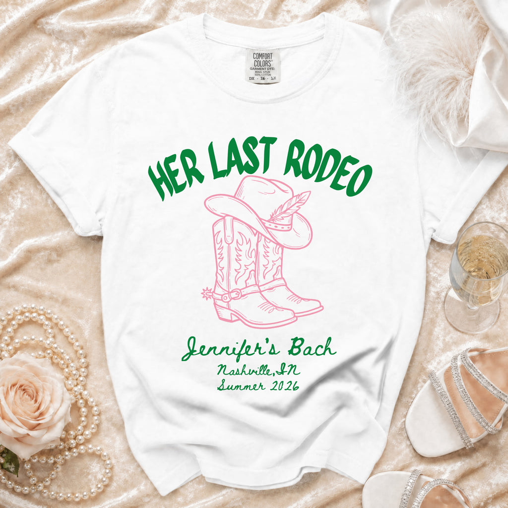 White t-shirt with "Her Last Rodeo" and cowboy boots graphic for Jennifer's Bach.