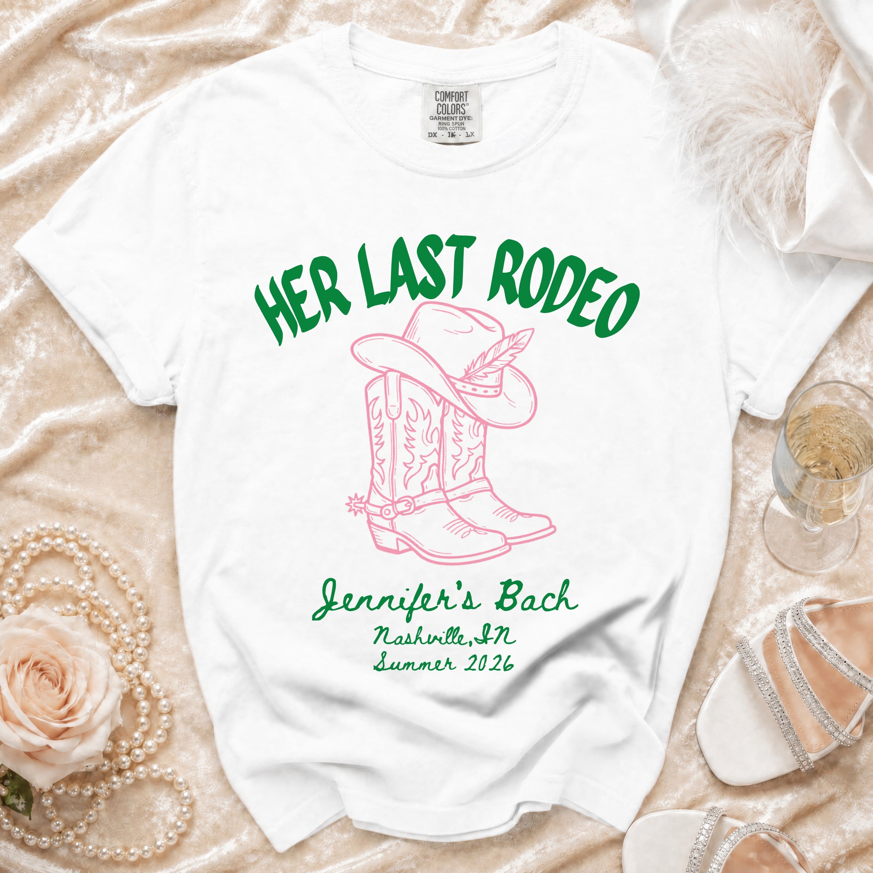 White t-shirt with "Her Last Rodeo" and cowboy boots graphic for Jennifer's Bach.