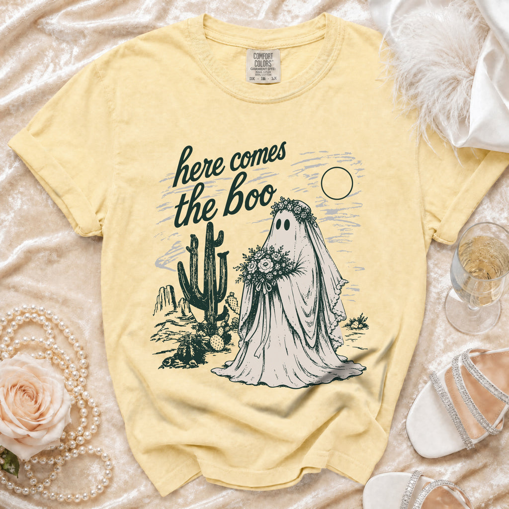Yellow t-shirt with "here comes the boo" text and ghost bride graphic.