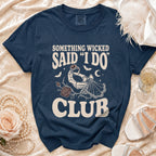 Navy t-shirt with "Something Wicked Said I Do Club" graphic and skeleton hand.