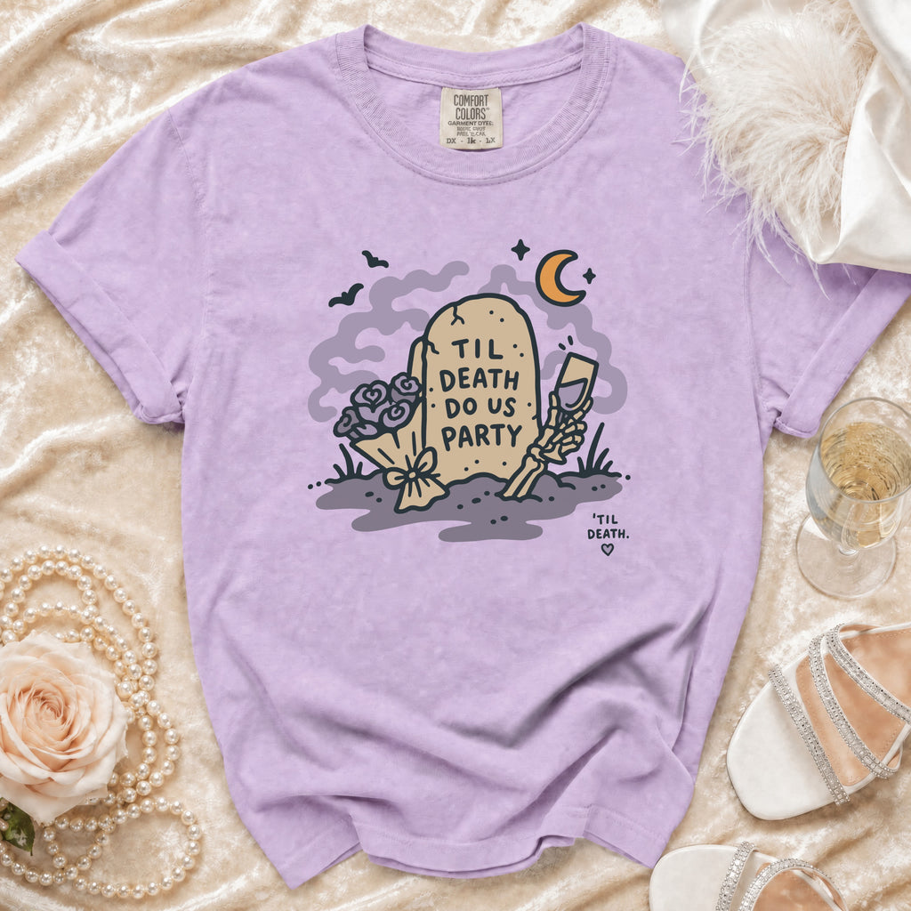Purple t-shirt with a tombstone graphic that reads "Til Death Do Us Party."