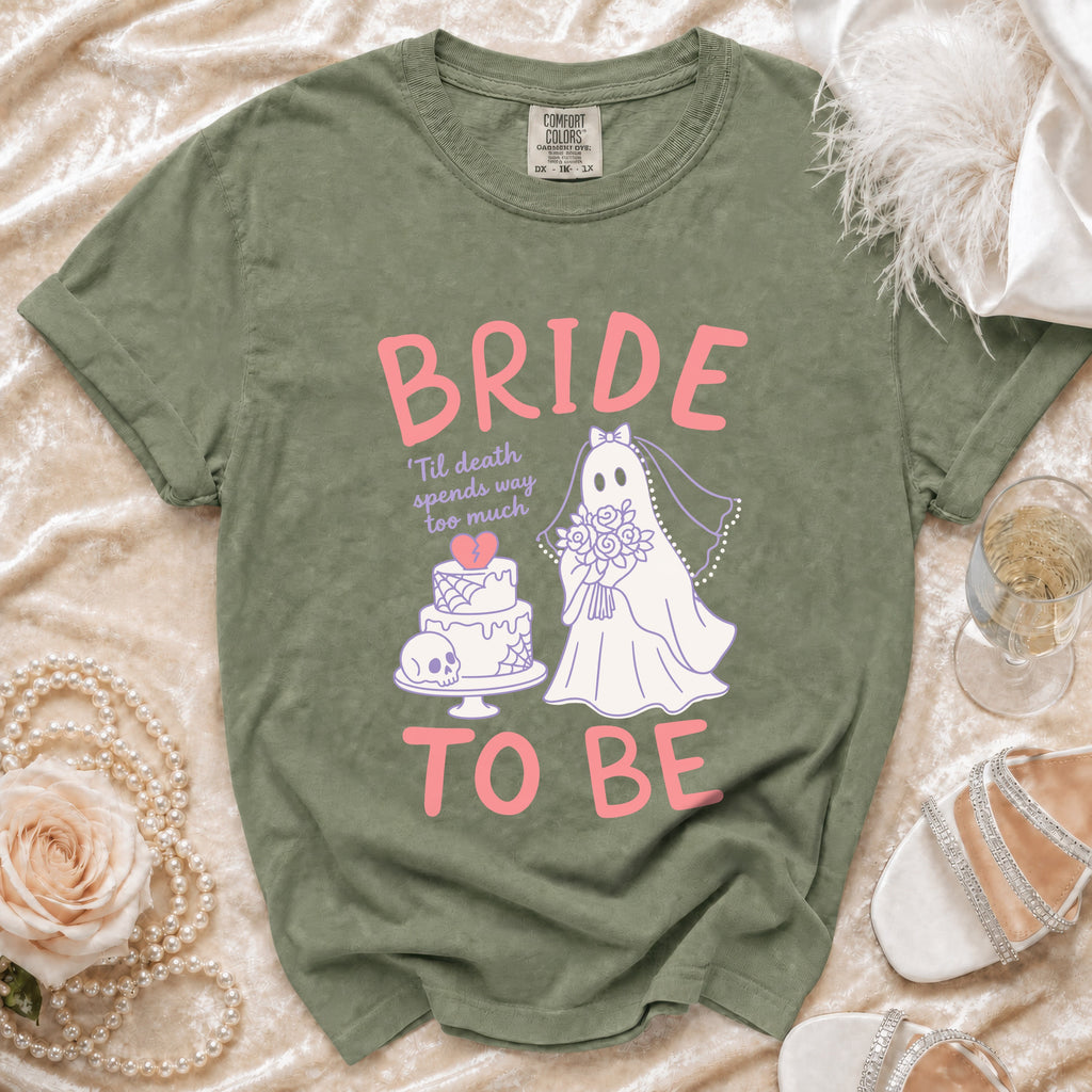 Olive green t-shirt with "BRIDE TO BE" text and a ghost bride design.