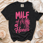 Black t-shirt with pink text "MILF of Honor", lips, champagne glasses, and flowers.