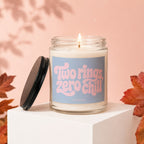 Candle with "Two rings, zero chill" text and "VOWED" logo.