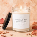 Candle with label reading "smells like a bridesmaid dress you'll wear once".