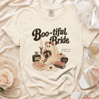 "Boo-tiful Bride" ghost graphic on a cream t-shirt with spooky wedding items.