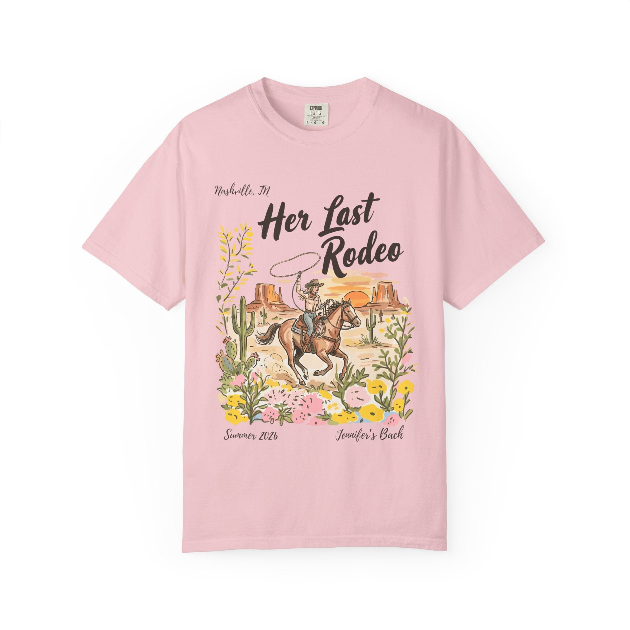 Pink t-shirt with "Her Last Rodeo" text and cowboy on horse illustration.