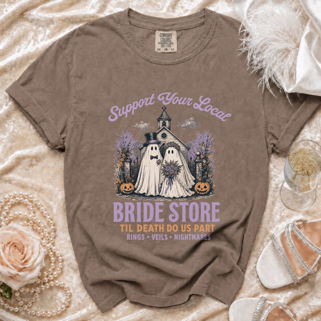 T-shirt with "Support Your Local Bride Store" and ghost couple graphic.