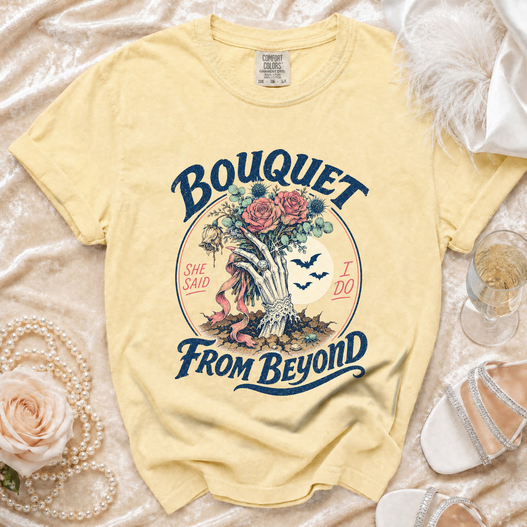 Yellow t-shirt with "Bouquet From Beyond" graphic featuring skeleton hand holding roses.