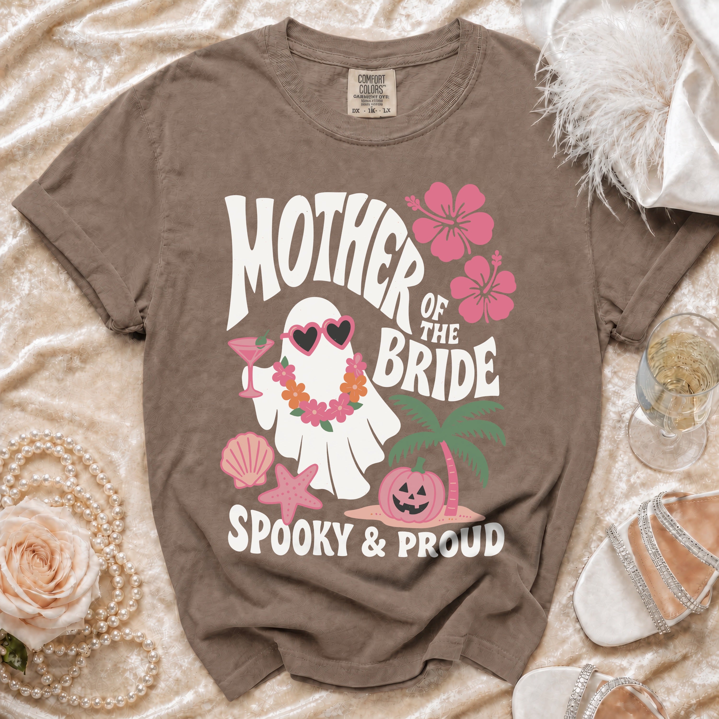 Brown t-shirt with "Mother of the Bride Spooky & Proud" graphic featuring a ghost and pumpkin.