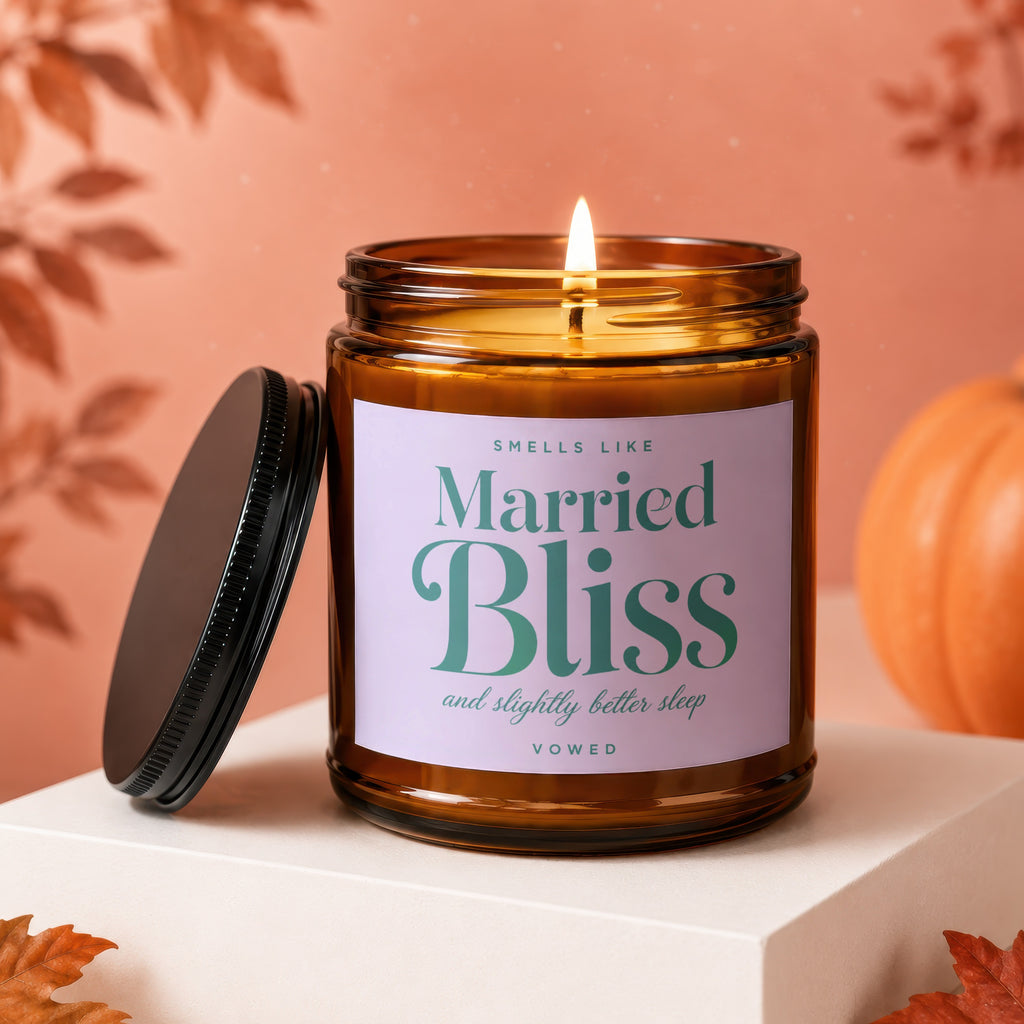 Amber glass jar candle with title "Married Bliss and slightly better sleep".