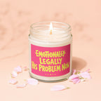 Lit candle in a glass jar with "Emotionally Legally His Problem Now" text.