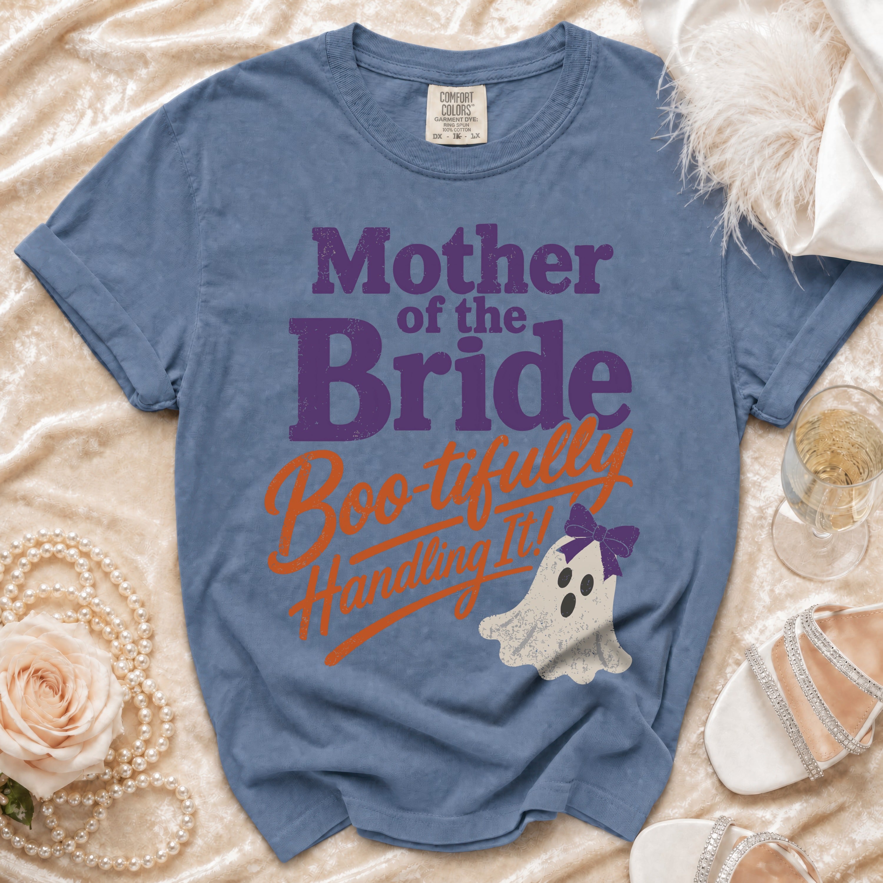 Blue t-shirt with "Mother of the Bride Boo-tifully Handling It!" and ghost graphic.