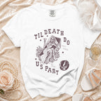 White t-shirt with "Til death do us part" text and skeleton bride in coffin graphic.