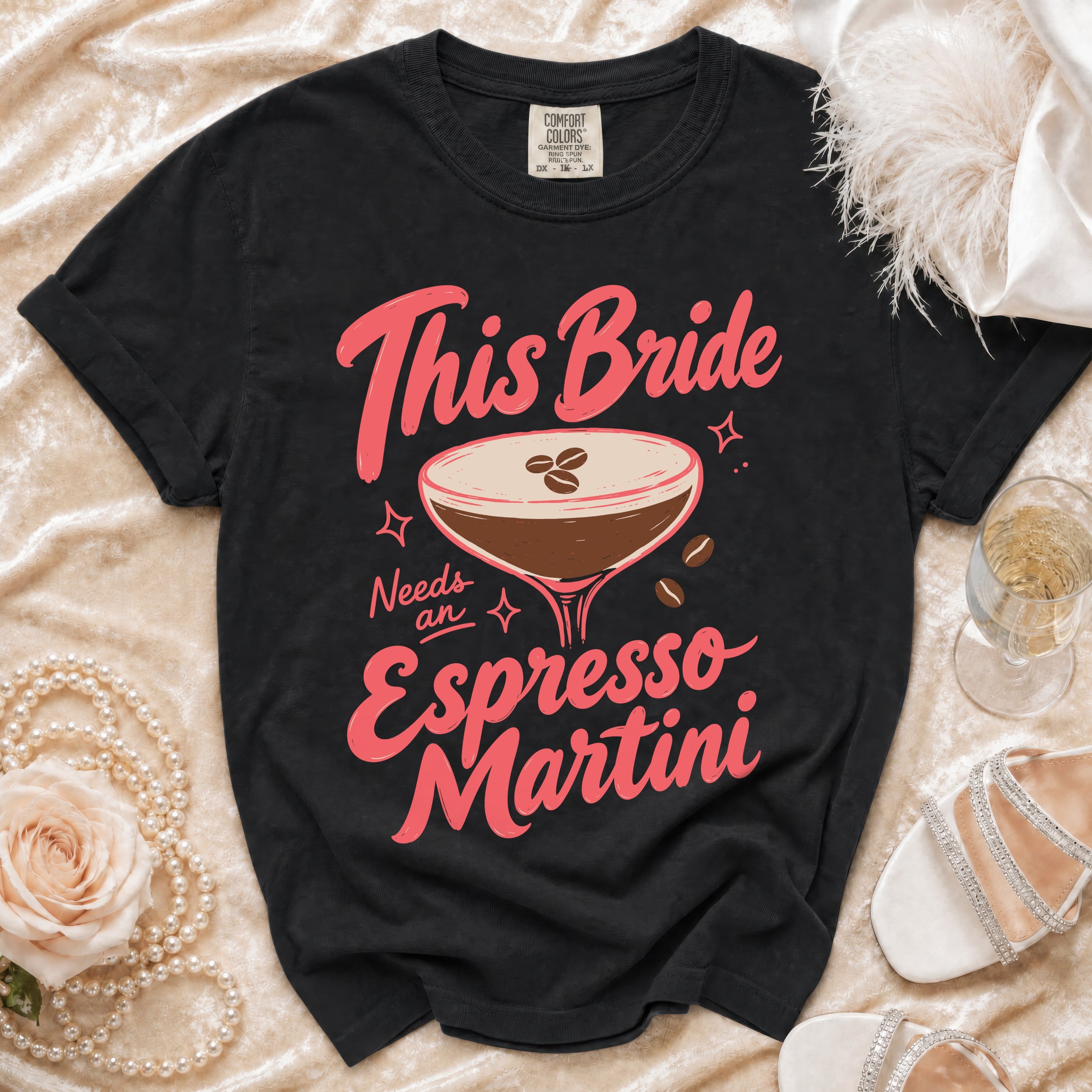 Black t-shirt with "This Bride Needs an Espresso Martini" text and graphic.
