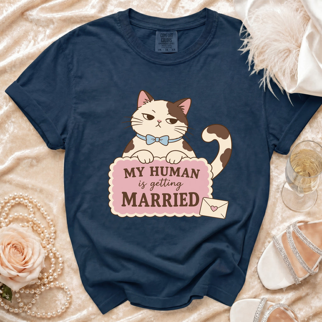 Navy t-shirt with cartoon cat graphic that reads "My human is getting married."