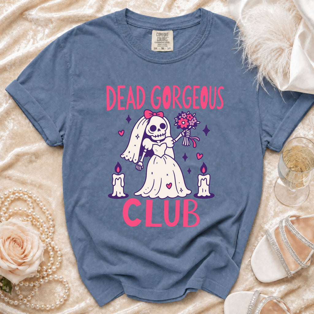 Blue t-shirt with "Dead Gorgeous Club" text and skeleton bride graphic.
