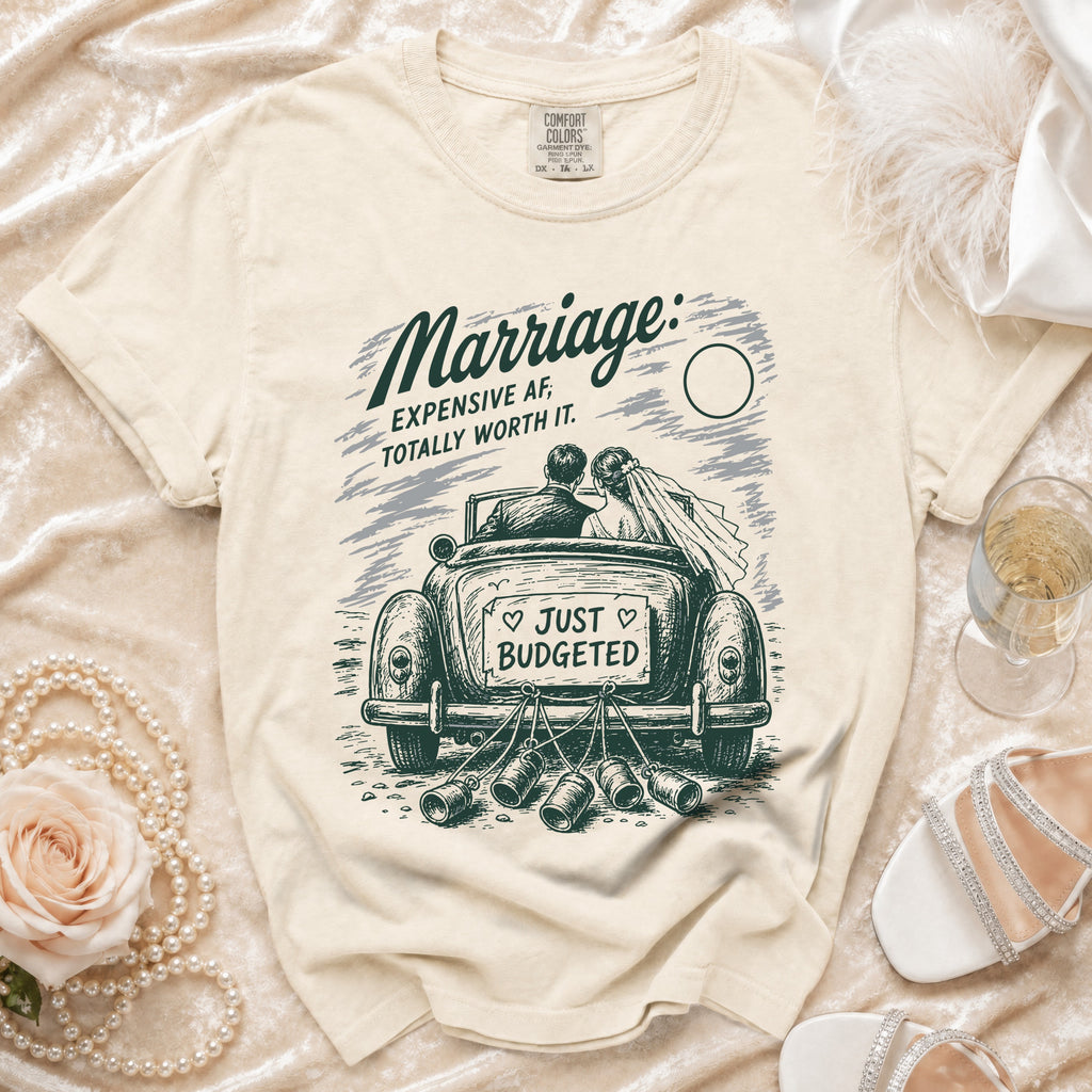 T-shirt with graphic of a wedding couple in a car, saying "Marriage: EXPENSIVE AF, TOTALLY WORTH IT."