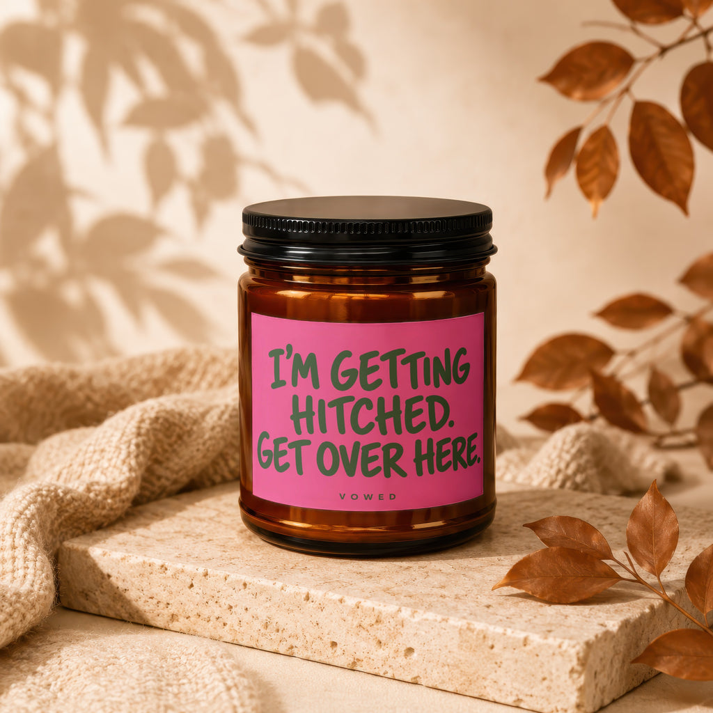 Brown candle with pink label saying "I'm Getting Hitched. Get Over Here."