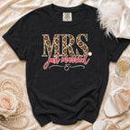 Black t-shirt with "MRS. just married" text, leopard print and ring graphic.
