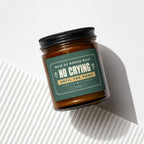 Amber glass candle with "Maid of Honor Rule: No Crying Until the Vows" text.