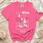 Pink bachelorette t-shirt with "Red, White & I Do" text, cowboy boots, and bride sash.