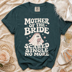 Green t-shirt with "Mother of the Bride Scared Single No More" and a ghost graphic.