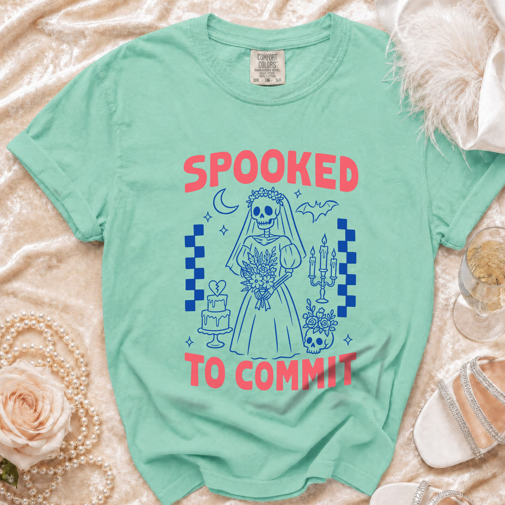 Mint t-shirt with "Spooked To Commit" text and skeleton bride graphic.