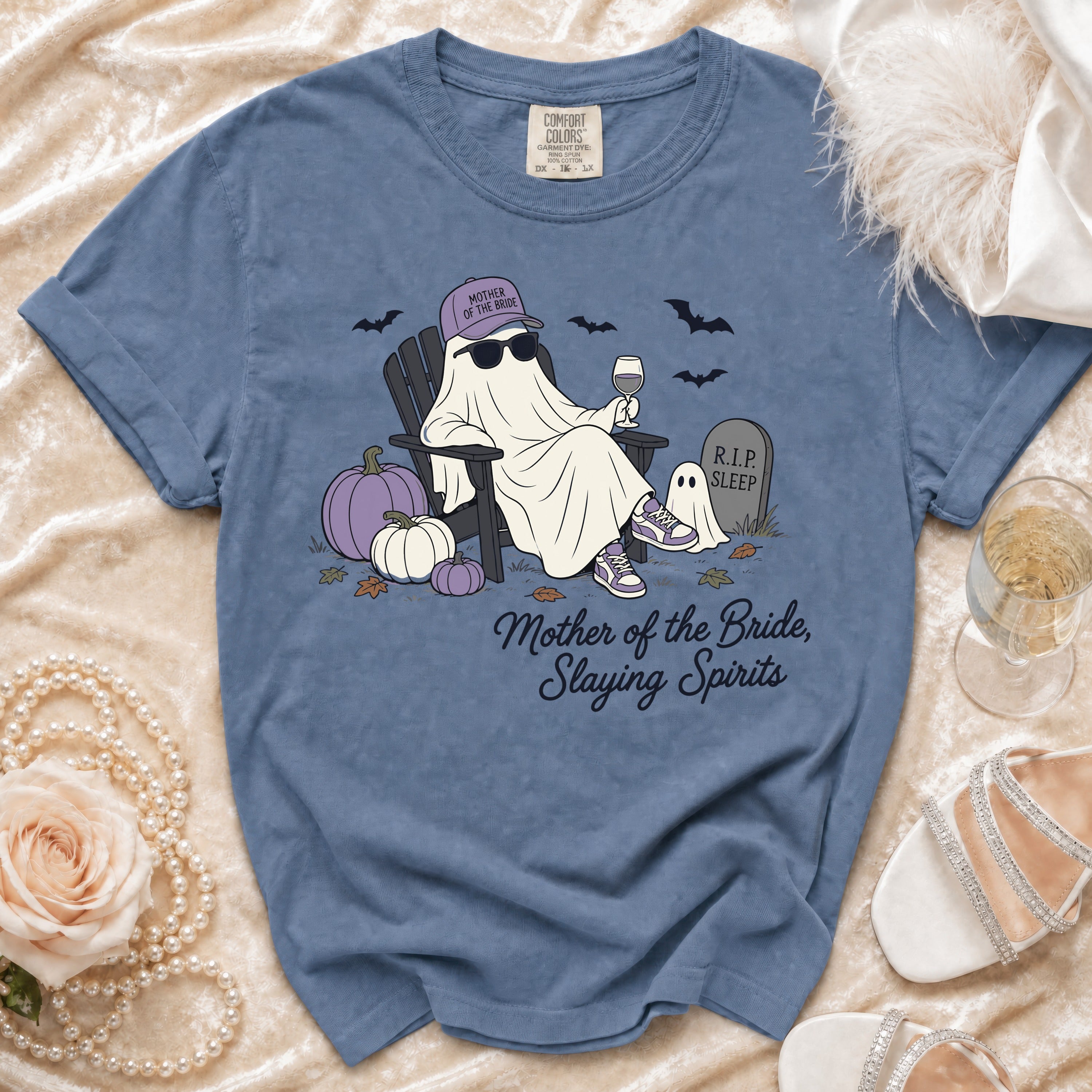 Blue t-shirt with a ghost wearing sunglasses and a "Mother of the Bride" hat.