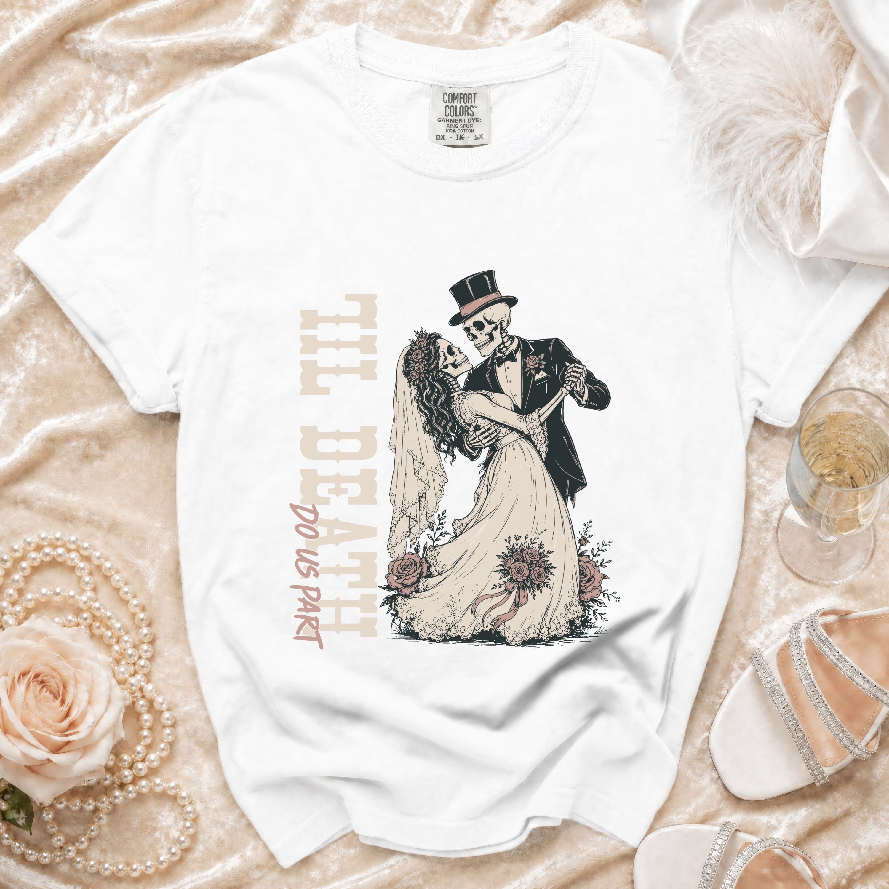 White t-shirt with skeleton bride and groom graphic and "Til Death Do Us Part" text.