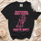 Black t-shirt with pink text "Professional Dress Fluffer Maid of Honor".