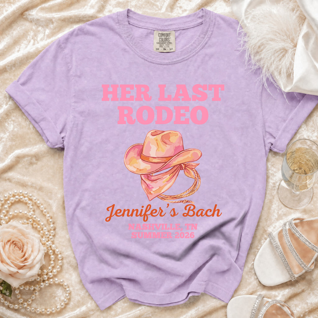 "Her Last Rodeo" t-shirt design with pink text and cowboy hat graphic.