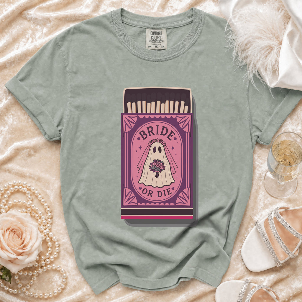T-shirt with a "Bride or Die" matchbox graphic featuring a ghost bride.