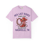 Pink t-shirt with "Her Last Rodeo" text, cowboy boot, hat, and rope.