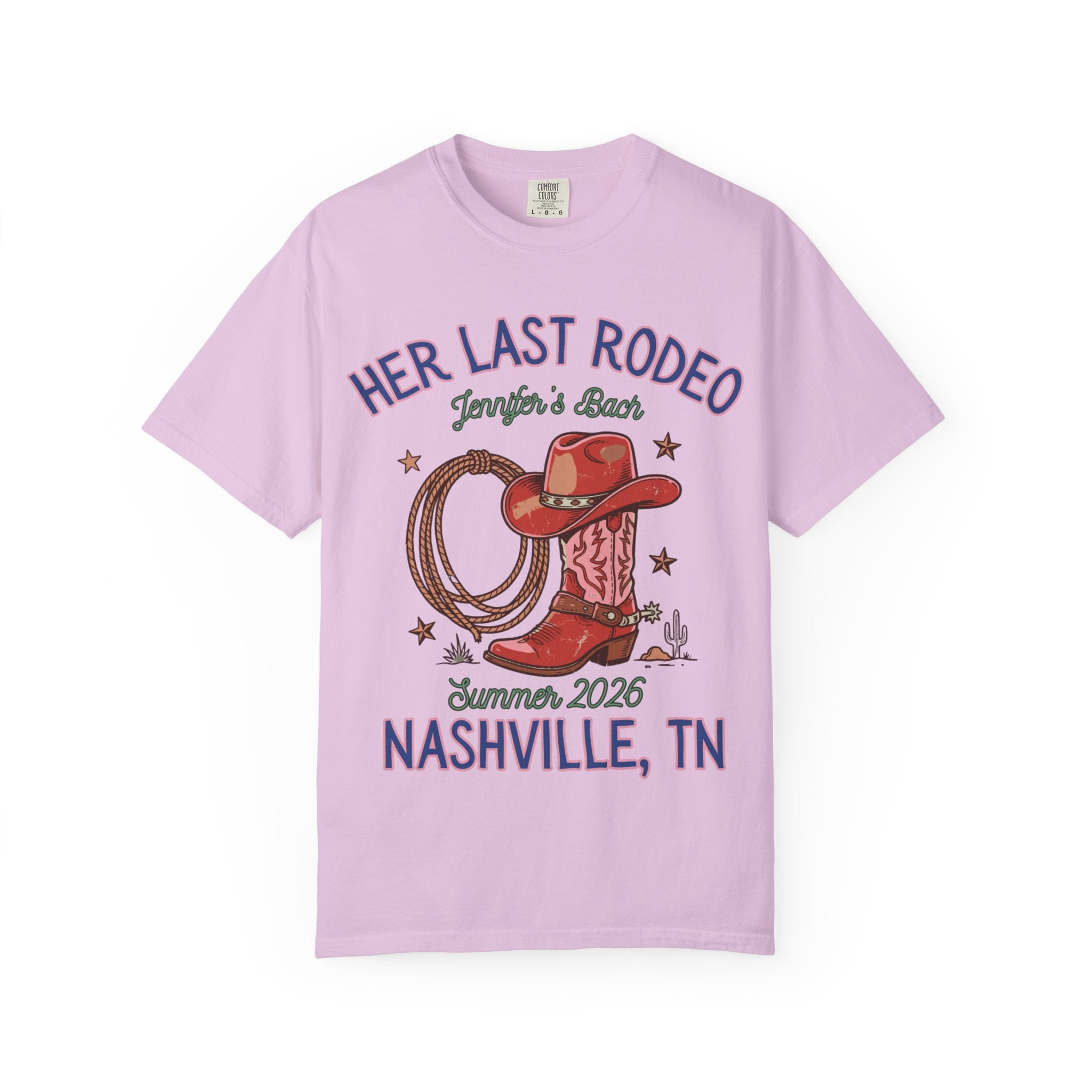 Pink t-shirt with "Her Last Rodeo" text, cowboy boot, hat, and rope.