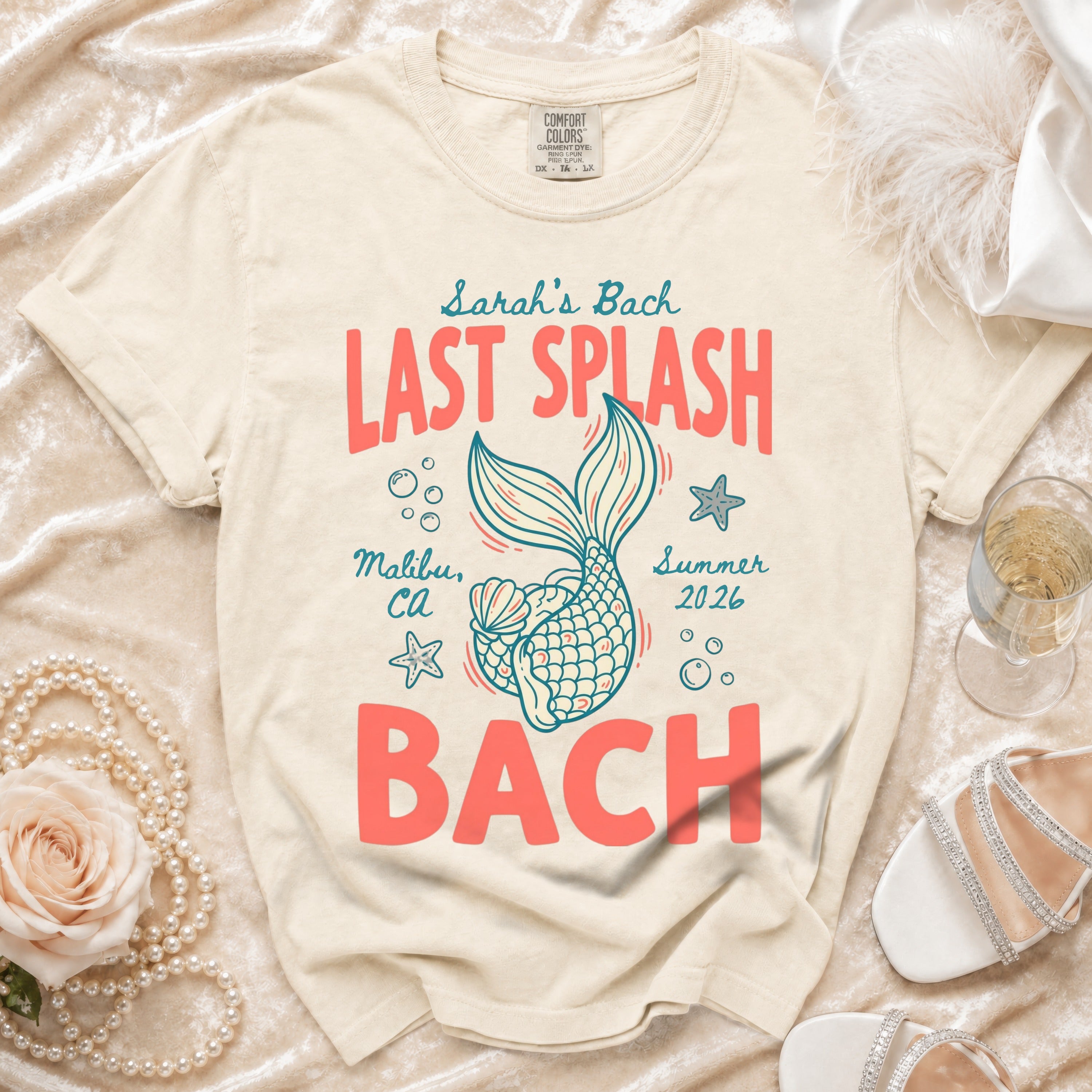 T-shirt with "Last Splash Bach" coral text, mermaid tail, starfish, and text.