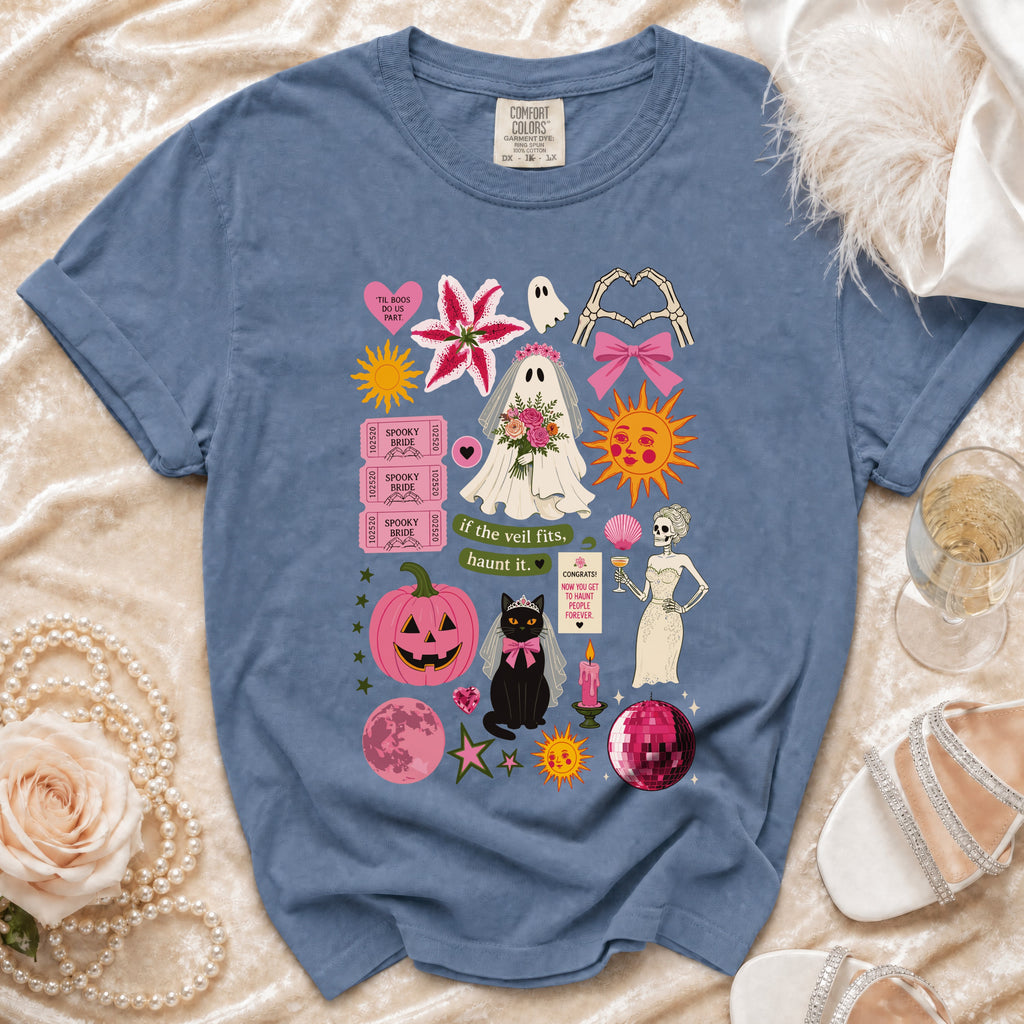 Blue t-shirt with Halloween wedding graphic: bride ghost, cat, pumpkin, skeleton, and spooky text.